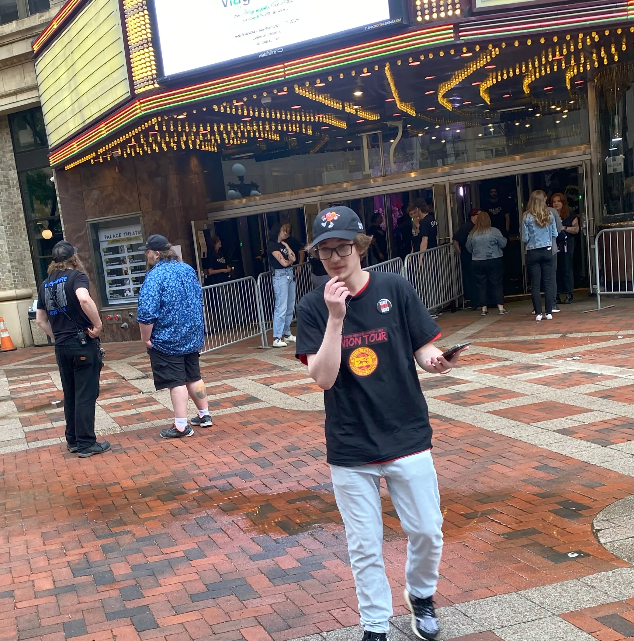 Wells Fargo Workers United action outside Killers concert